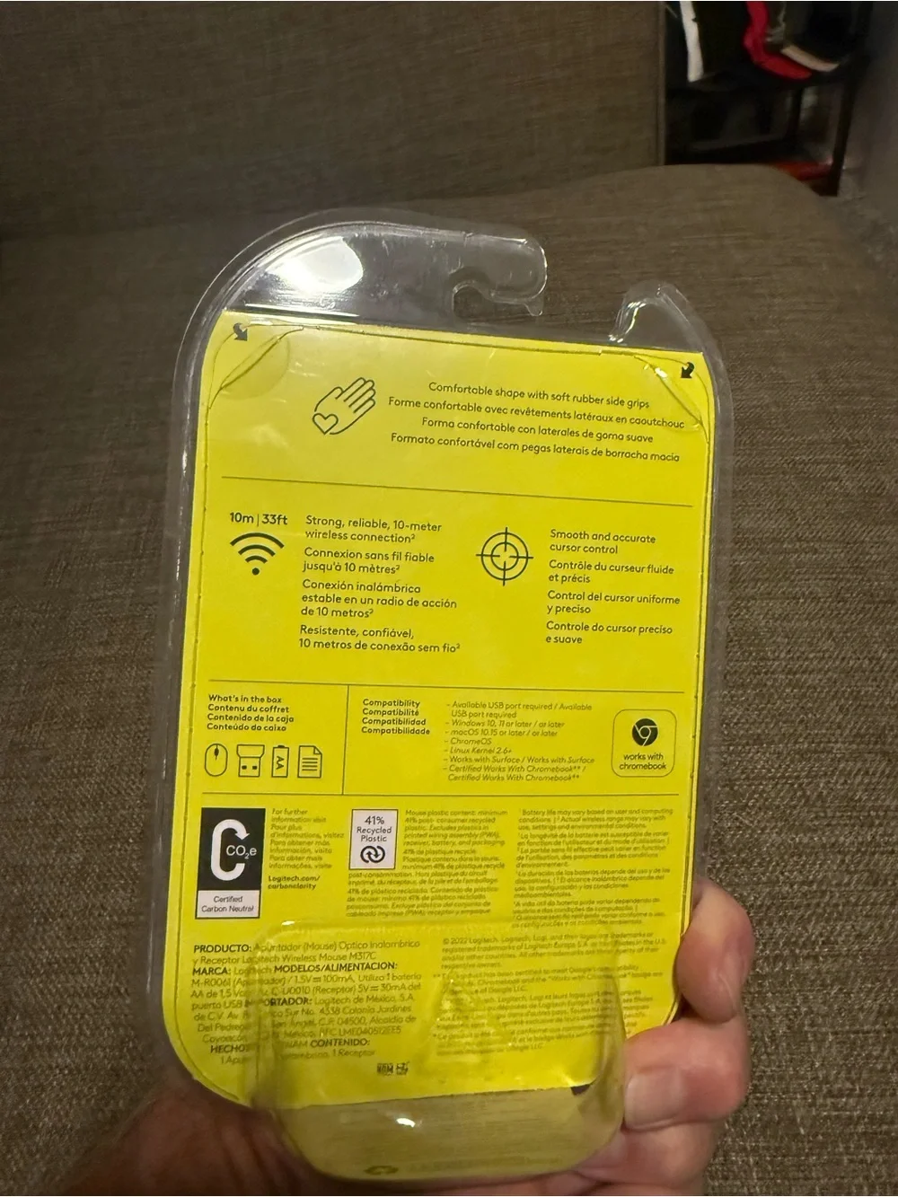 Logitech Wireless Mouse Packaging - Yellow and Clear